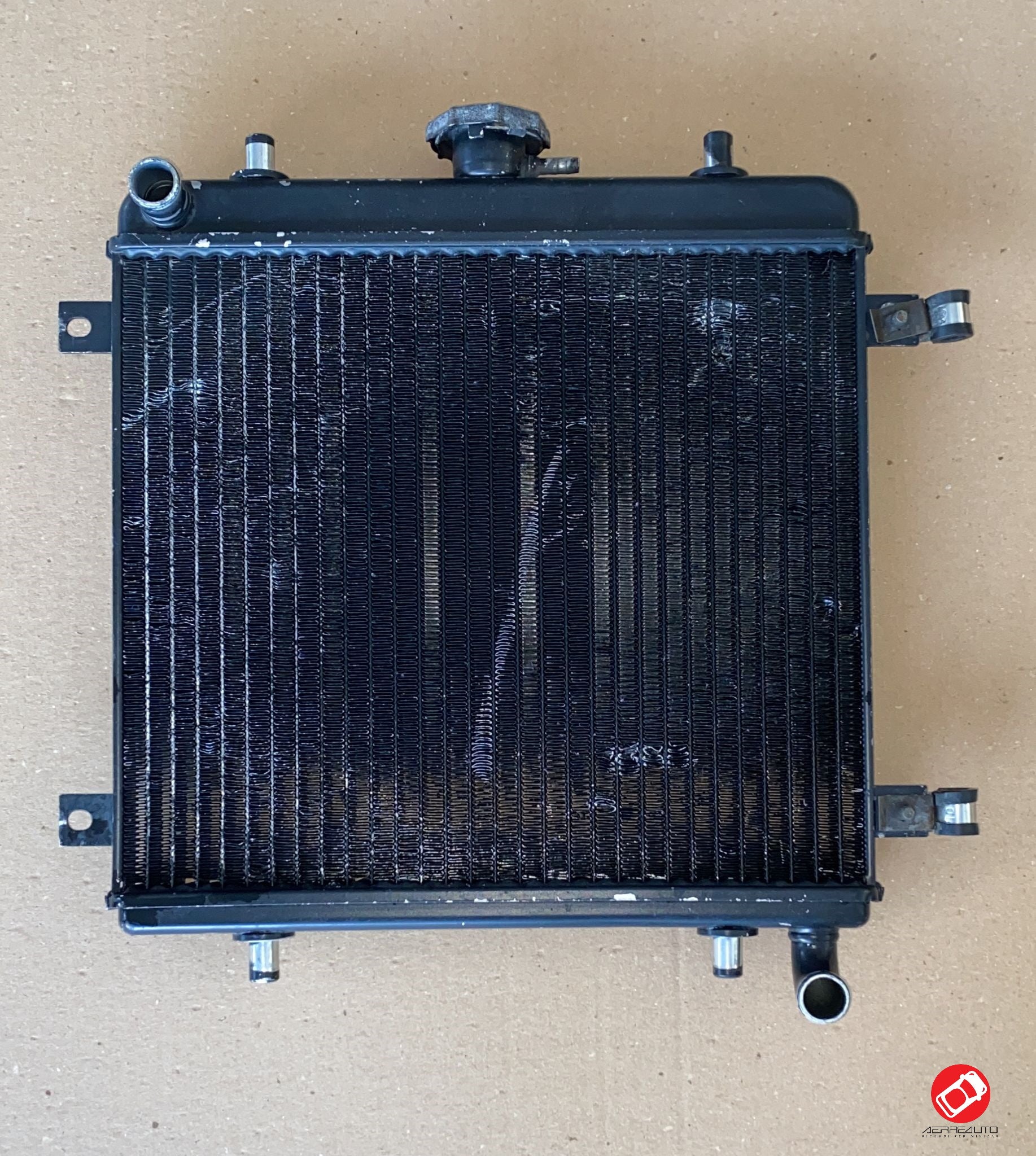 Grecav radiator with cap