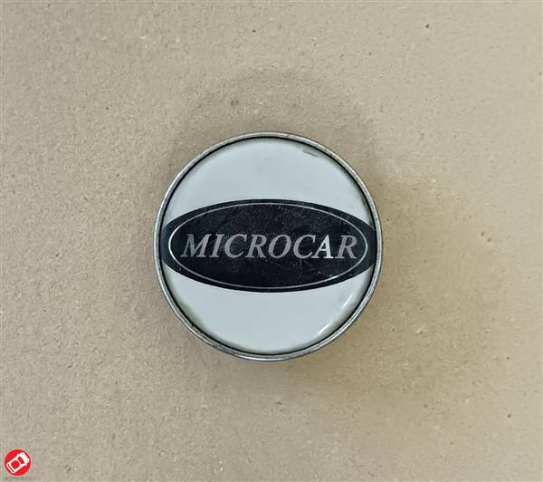 1000645 LOGO COPRICERCHIO MICROCAR MC1 2 VIRGO I II III