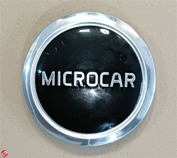 1401584 LOGO COPRICERCHIO MICROCAR M8 M.GO 3 4 5 FLEX DUE 3 5 P85