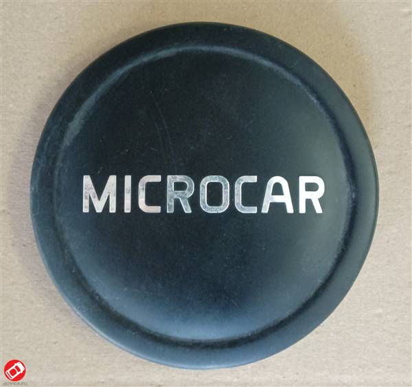 1408352 LOGO COPRICERCHIO NERO MICROCAR M.CROSS DUE M.GO 3 4 5