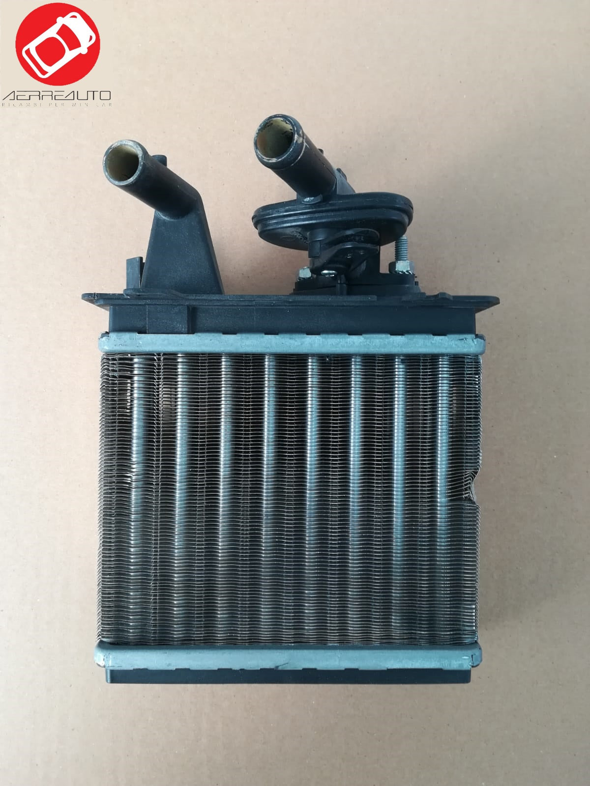 Heated radiator complete with tap